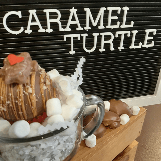 turtle-cocoa-bomb caramel turtle hot chocolate bomb
